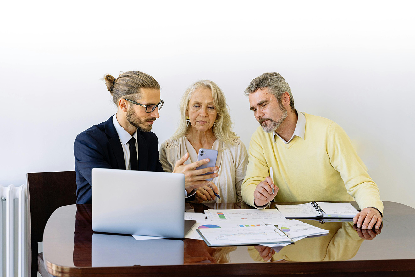 insurance planner explaining to clients